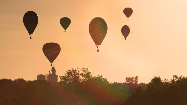istock Six Hot Air Balloons Float Above Iowa 1256957063