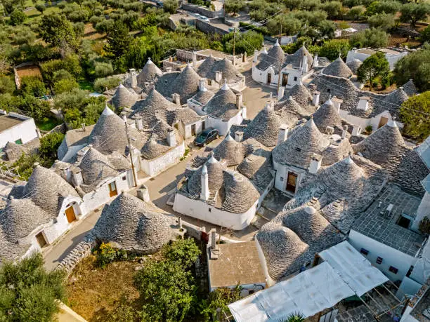 Trulli houses in Alberobello town. A trullo is a traditional Apulian dry stone hut with a conical roof.