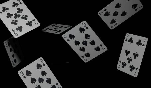 istock 3d rendering illustration of a playing cards in dark background 1256958007