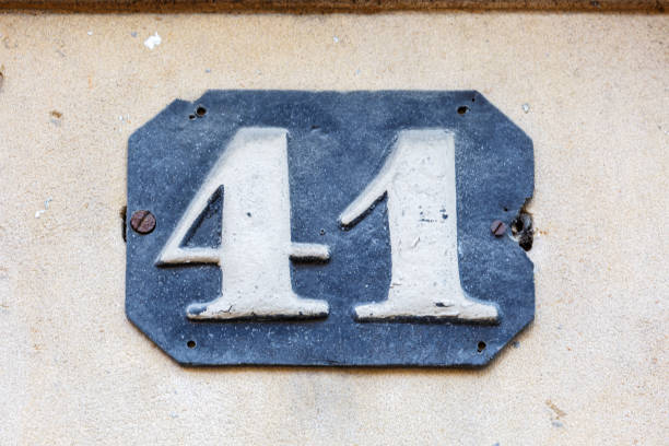 istock Plate on house wall with number 41 1256972419