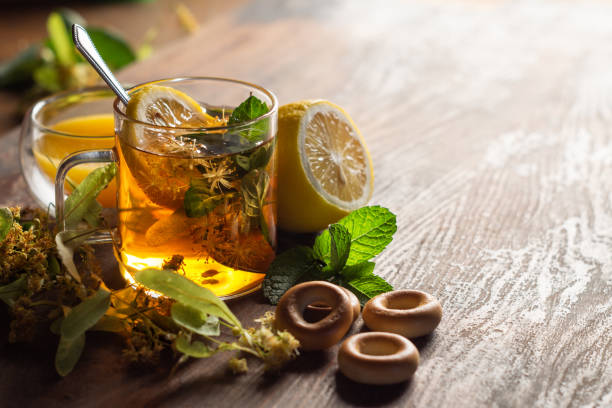 istock Hot linden blossom drink with honey and lemon 1256972728