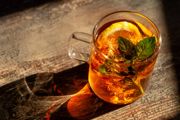 istock Hot linden blossom drink with mint and lemon 1256973430