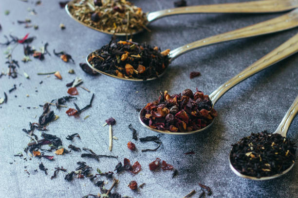 istock Various types of herbal tea in spoons. Spoons with dry tea leaves 1256979120