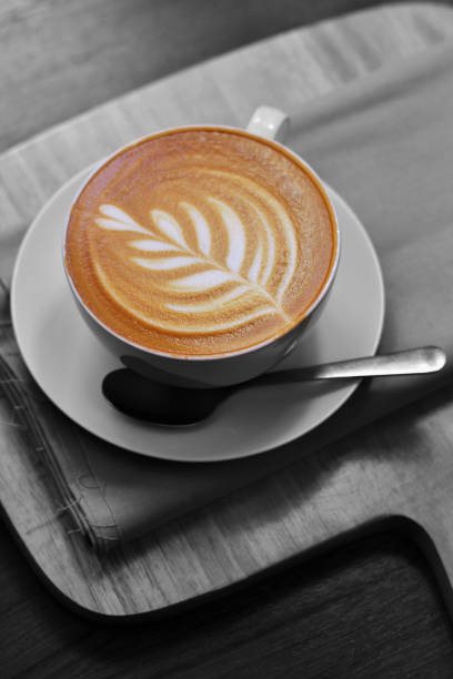 istock Latte art coffee on placemats and Chopping board 1256984380