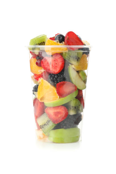 istock Fruit salad in takeaway cup isolated on white background 1256989024