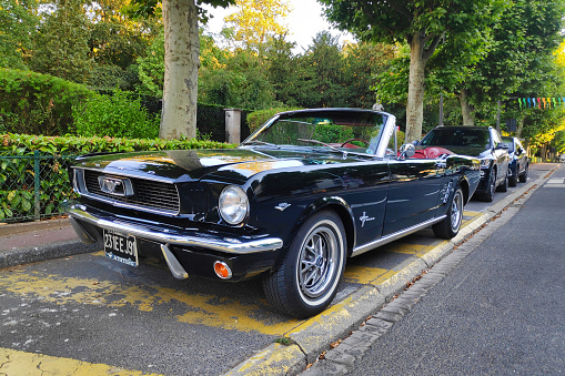 Chantilly, France - July 18 2020: Ford Mustang convertible parked in the street.