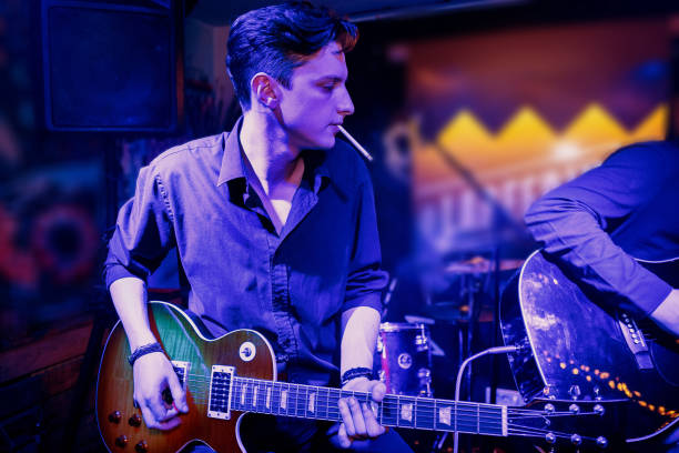 istock Acoustic performance by a rock music band 1256992464