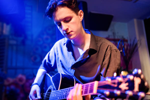 istock Acoustic performance by a rock music band 1256992466