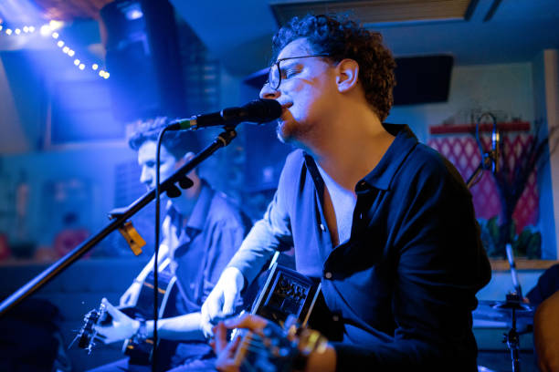 istock Acoustic performance by a rock music band 1256992467