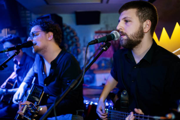istock Acoustic performance by a rock music band 1256992487