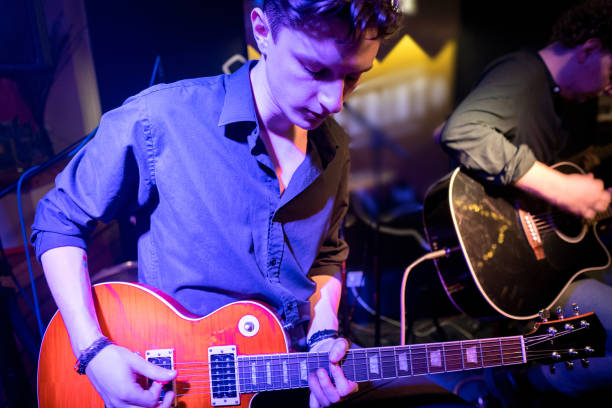 istock Acoustic performance by a rock music band 1256992488
