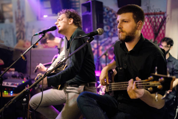 istock Rock band playing on the concert 1256992529