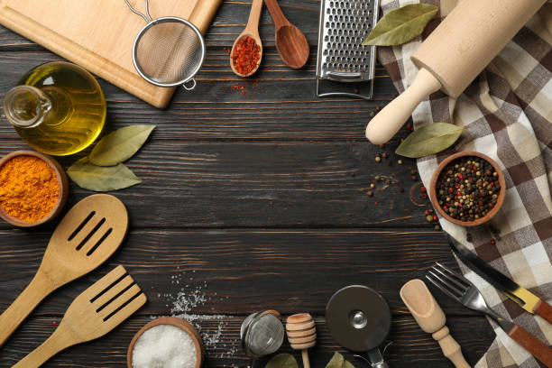 istock Composition with different kitchen cutlery on wooden background, space for text 1256994013