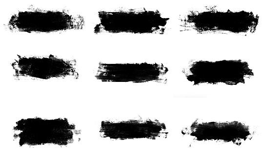 set of nine black strokes of paint isolated on a white background. design brush