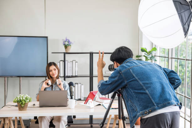 istock Video cameraman record live vlog blogger 1256999298