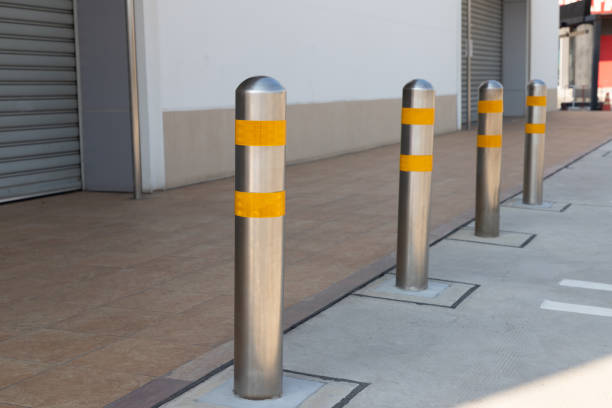 istock steel bollards with yellow reflec strip. 1257001800