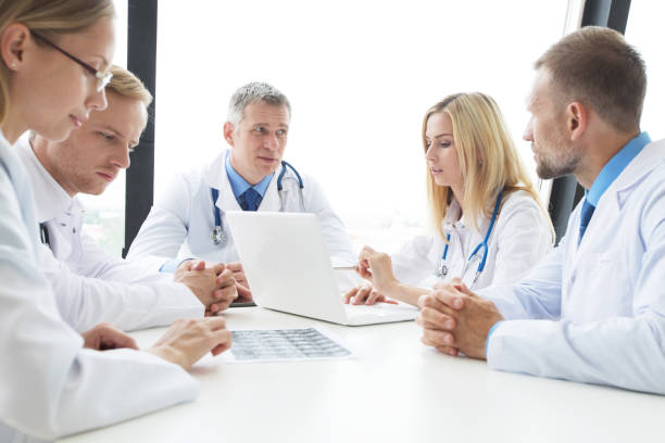 istock Team of expert doctors at clinic 1257001936