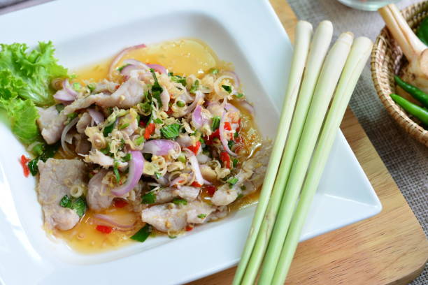 istock Spicy pork with lime salad 1257003743
