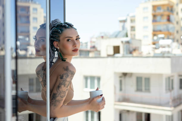 Young woman enjoying in balcony