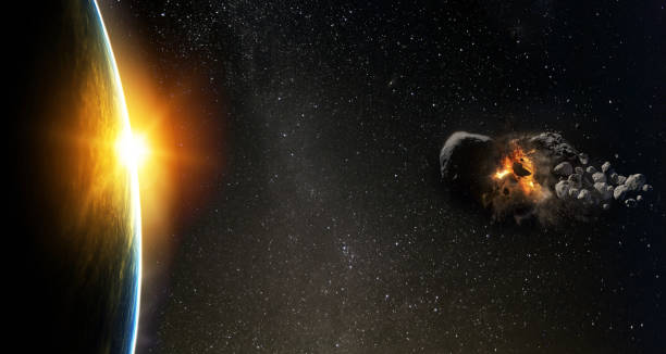 istock Asteroid flies near the earth orbit. Meteorite approaching Earth.  Elements of this image furnished by NASA. 1257003992