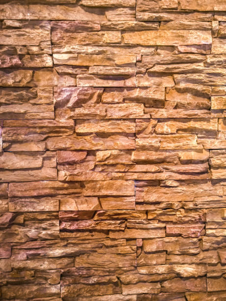 istock Orange grunge brick wall for background 1257004075