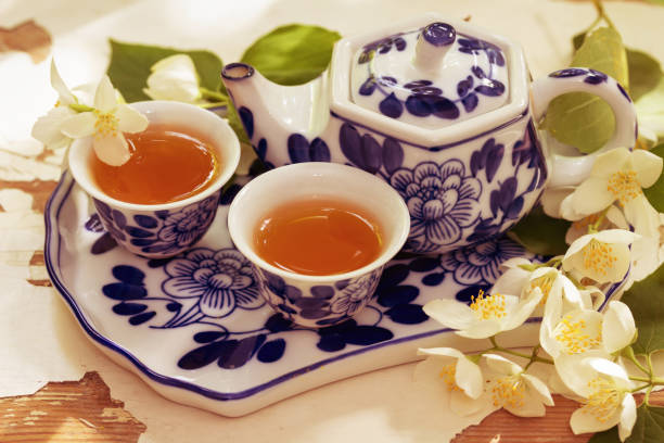istock Tea with jasmine. Tea tray and jasmine flowers. 1257004853