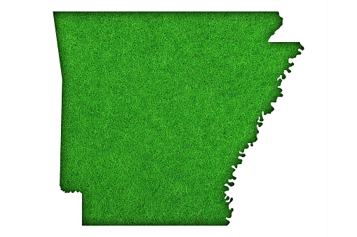 Map of Arkansas on green felt