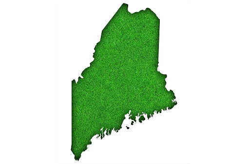 Map of Maine on green felt