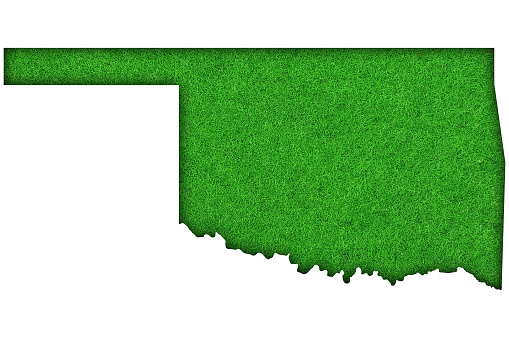 Map of Oklahoma on green felt