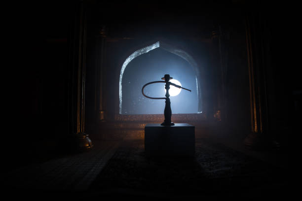 istock A realistic Arabian interior miniature with window and columns. Hookah hot coals on shisha bowl making clouds of steam. Stylish oriental shisha miniature 1257008399