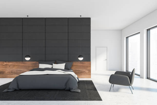 istock Grey tile and white bedroom with armchair 1257009713