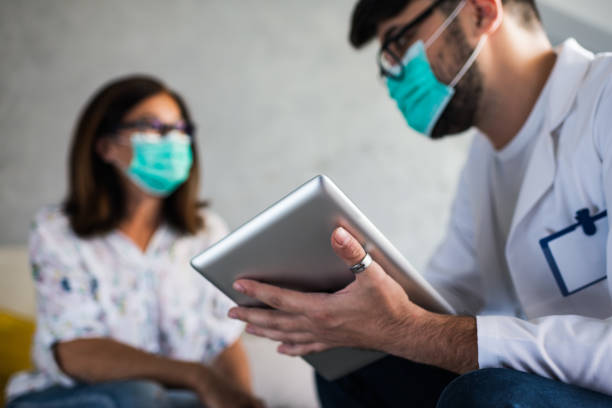 istock Healthcare worker at home visit 1257010194