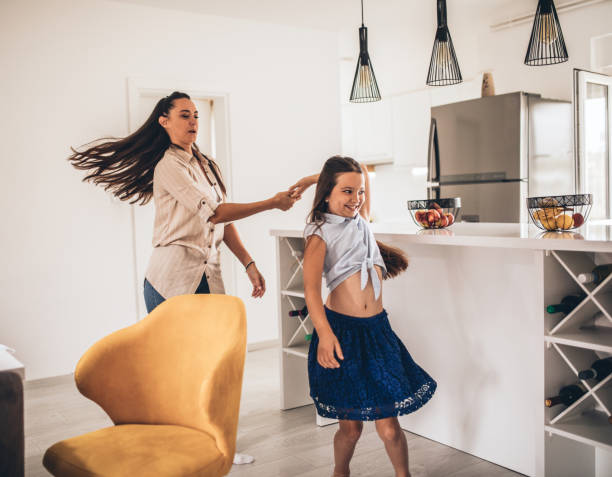 istock Mother Helping To Her child To Finish School Homework During Coronavirus Quarantine 1257014508
