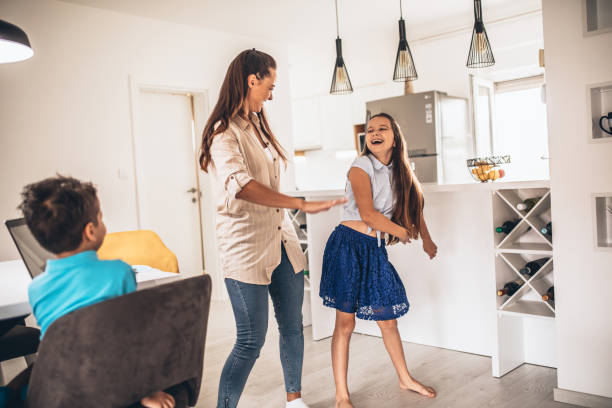 istock Mother Helping To Her child To Finish School Homework During Coronavirus Quarantine 1257014543