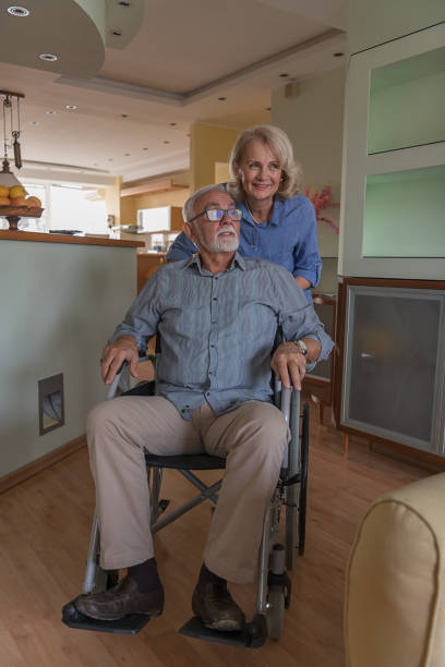 istock Woman Shows a Love to her Disabled Man. 1257016111