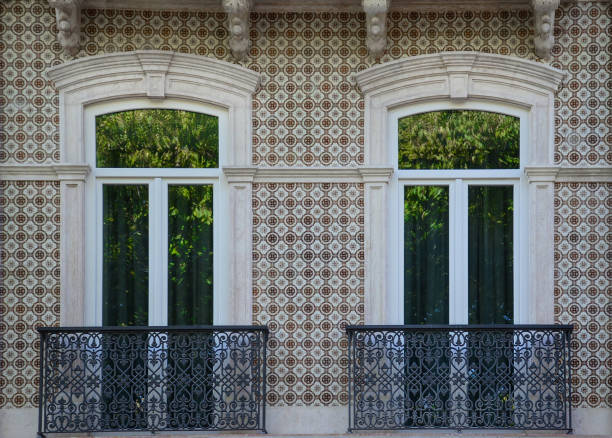 istock Typical portuguese window with ornamental tiles called 