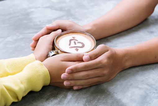 coffee lover concept. Close up woman hands holding cup of coffee. Drinking coffee make people fresh and more concentrate on job. winter need hot drinking coffee is the best choice.