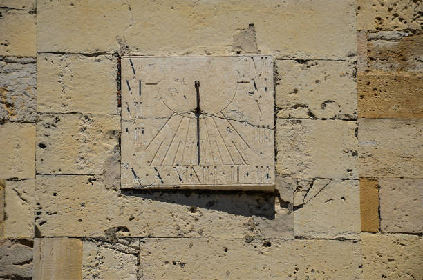 istock Sun dial, solar wall clock on a building in Lisbon, Portugal 1257017626