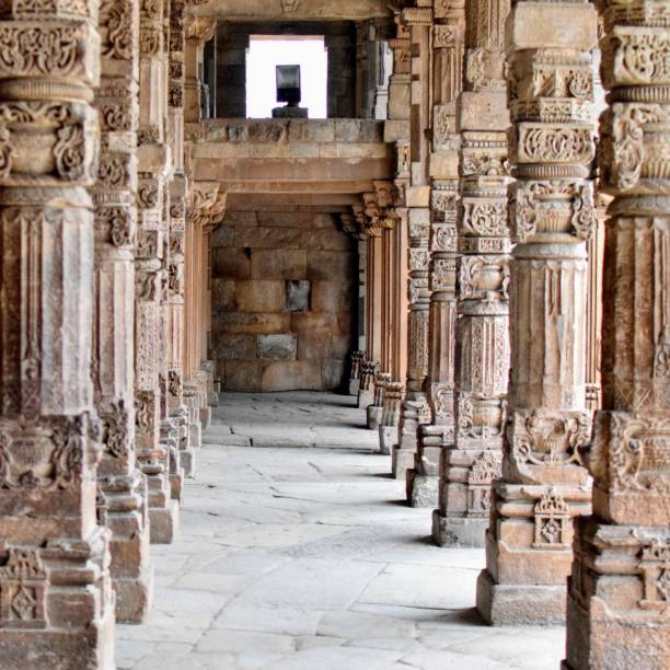 istock Inside the Qutub Minar Complex with antic ruins and inner square. UNESCO World Heritage in Mehrauli, Old Architecture inside Qutub Minar during the day time in Delhi India, Qutub Minar inside old architecture 1257019722