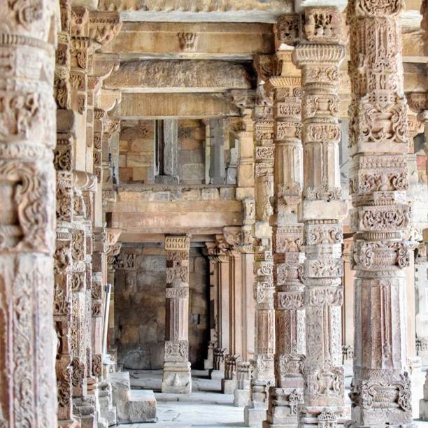 istock Inside the Qutub Minar Complex with antic ruins and inner square. UNESCO World Heritage in Mehrauli, Old Architecture inside Qutub Minar during the day time in Delhi India, Qutub Minar inside old architecture 1257019731