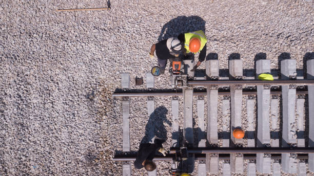 istock Rail tracks maintenance process. Repairing railway. 1257019810