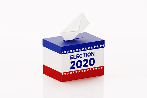 Election 2020 written ballot box and white envelope sitting on white background. Horizontal composition with clipping path and copy space. 2020 US Presidential Election concept.