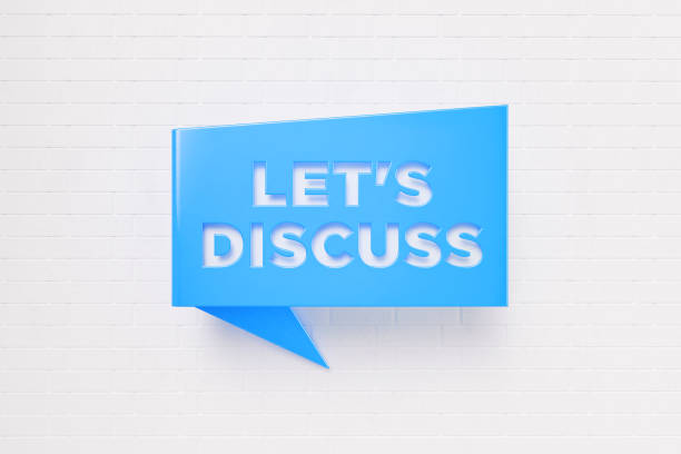 istock Let's Discuss Written Blue Chat Bubble over White Brick Wall Background 1257022609