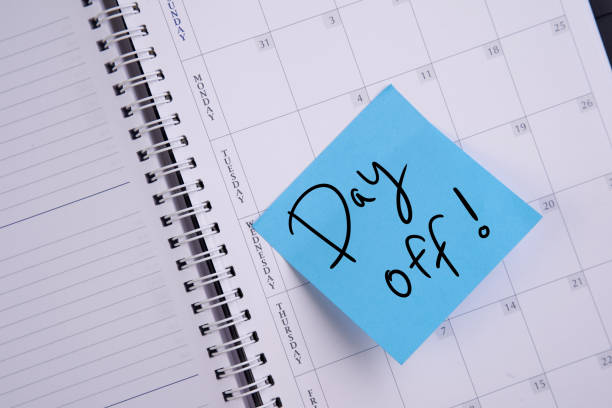 Day 1 text on note pad with copy space background. Stock photo.