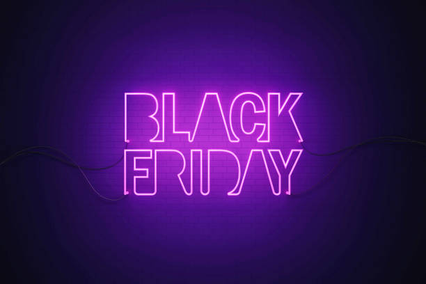 Purple neon light writes Black Friday on black wall. Horizontal composition with copy space. Black Friday concept.