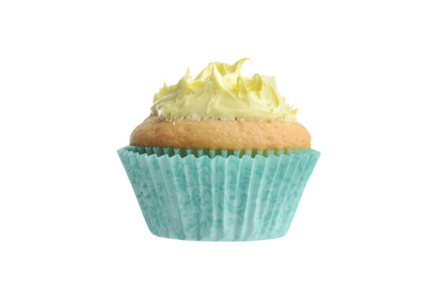 istock isolated cupcake with yellow frosting in blue paper cup 1257026525