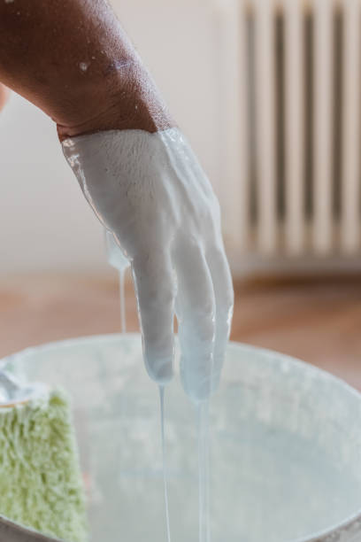 istock Man preparing a paint for painting 1257026589