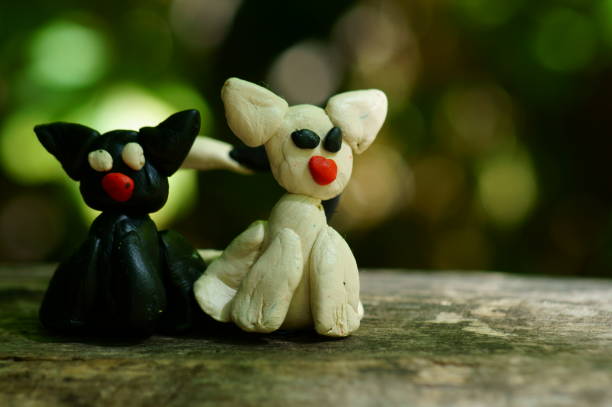 istock Figures of two cats in love. 1257027051