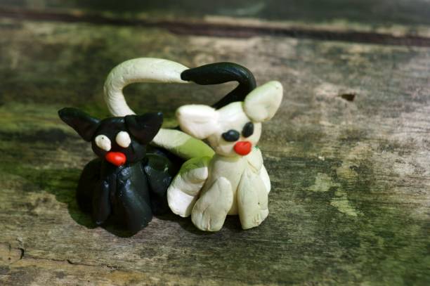 istock Figures of two cats in love. 1257027067