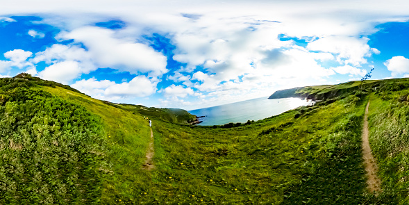 Lantic and Lantivet Bay, Cornwall, England, UK. This is the coastal path to the scenic Lantic bay set in cliffs along the south Cornwall coast. This is a VR taken on a Ricoh Theta SC 360 degree camera.